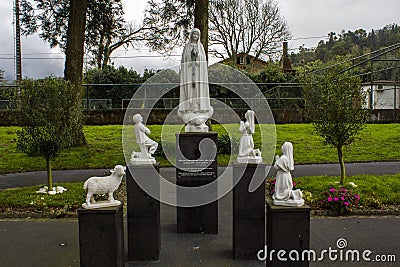 Statue of Our Lady of Fatima and the three little shepherds Editorial Stock Photo