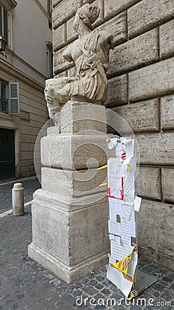 Statue of Paquino with free speech fliers, Rome, Italy Editorial Stock Photo