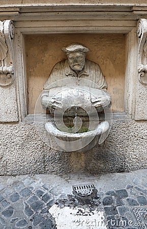 Statue of the Porter in the fountain called FONTANA DEL FACCHINO Stock Photo