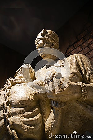 Statue portraying slavery. Editorial Stock Photo