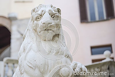 Statue of a proud lion with shield Stock Photo