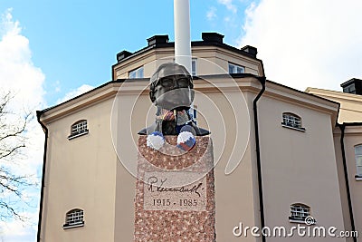 Statue of Ragnar Lassinantti in front of the White Dove in LuleÃ¥ Editorial Stock Photo