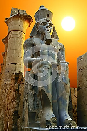Statue of Ramesses II at sunset. Luxor Temple, Egypt Stock Photo