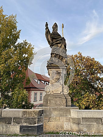 Statue of Saint Augustine on the Charles Bridge in Prague, Czech Republic Editorial Stock Photo