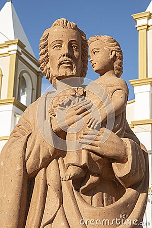 Statue of Saint Joseph with child Jesus Stock Photo