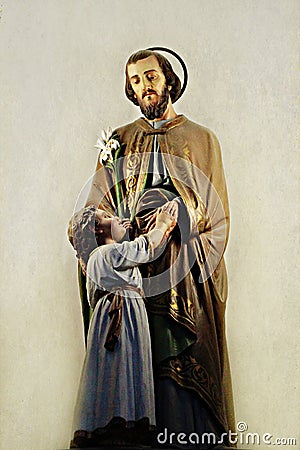 Statue Saint Joseph with little Jesus Stock Photo