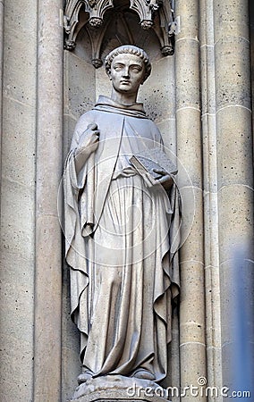 Statue of Saint on the portal of the Basilica of Saint Clotilde in Paris Editorial Stock Photo