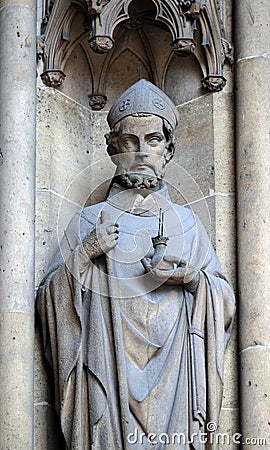 Statue of Saint on the portal of the Basilica of Saint Clotilde in Paris Stock Photo