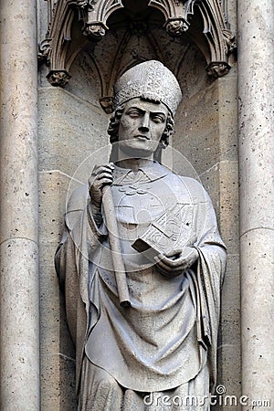 Statue of Saint on the portal of the Basilica of Saint Clotilde in Paris Stock Photo