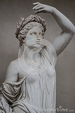 Statue of sensual Roman renaissance era woman in circlet of bay Stock Photo
