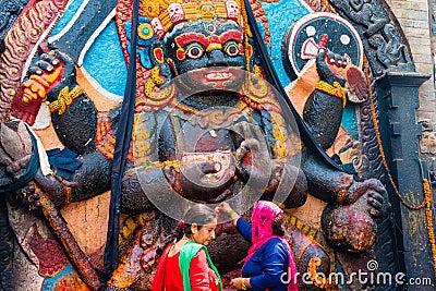 Statue and shrine of Kal Bhairav at Kathmandu Durbar Square, Kathmandu Valley, Nepal Editorial Stock Photo