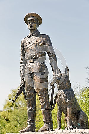 Statue of Soviet border guard with a dog in Lysianka, Ukraine. Editorial Stock Photo