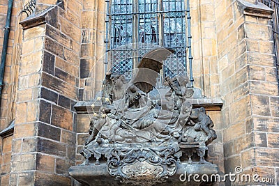 Religious statue outside St. Vitus Cathedral in Prague. Stock Photo