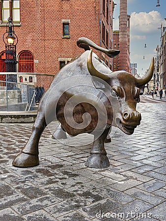 Statue of the stock market bull outside of the stock exchange in Amsterdam Editorial Stock Photo