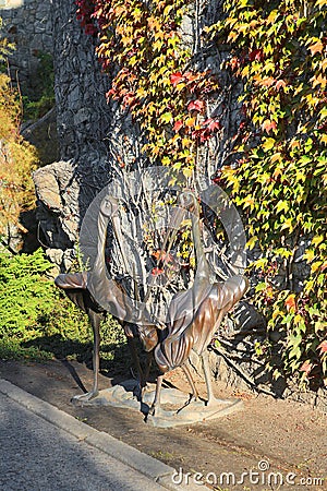 Statue of storks in Buki park, Kyiv region, Ukraine Editorial Stock Photo