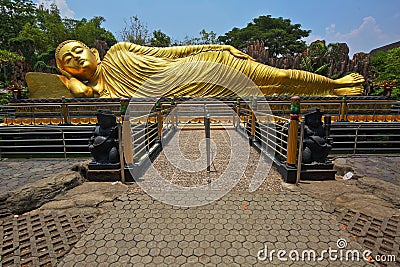 Reclining Golden Buddha Statue Parinirvana Stock Photo
