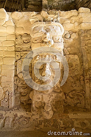 Statue on the Temple of the Masks at Kohunlich Mexico Stock Photo