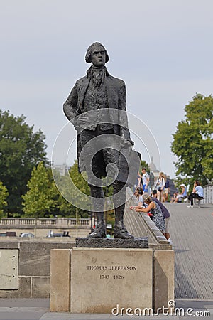 Statue of Thomas Jefferson, by JeanCardot shows him holdingarchitectural drawings of Monticello as he looks at inspiration Hotel Editorial Stock Photo