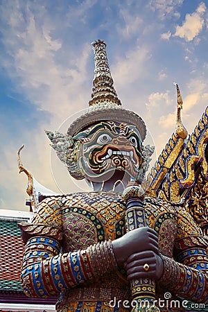 Statue of Thotsakhirithon, giant demon Yaksha guarding an exit at the Wat Phra Kaew Palace, also known as the Emerald Buddha Tem Stock Photo