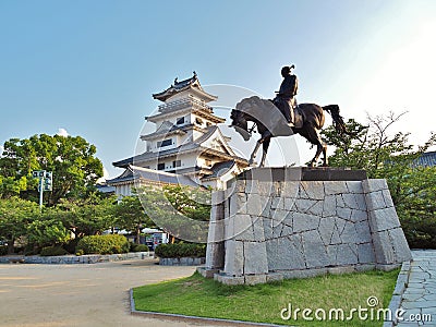 Statue of Todo Takatora and Imabari Castle. Editorial Stock Photo