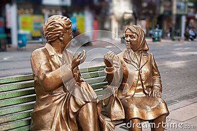 Statue of two women having a chat while stting on bench in Eskisehir Turkey Editorial Stock Photo