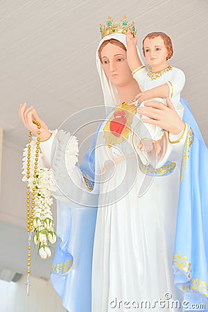Statue Virgin Mary with Jesus Stock Photo