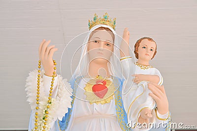 Statue Virgin Mary with Jesus Stock Photo