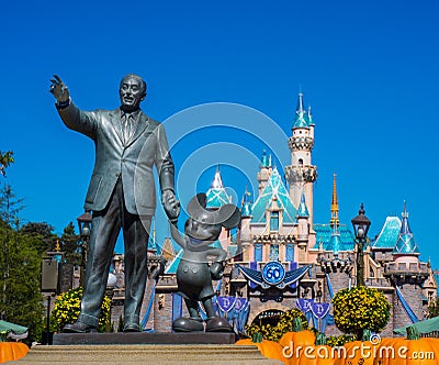 Walt Disney Mickey Mouse Statue with Cinderella Castle Editorial Stock Photo