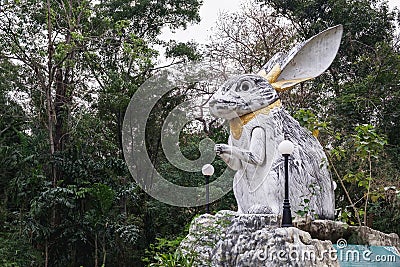 The statue of the white rabbit in the garden of the Wat Samphran, Thailand Editorial Stock Photo