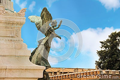 Statue of a winged woman in Piazza Venezia, Rome, Italy Stock Photo