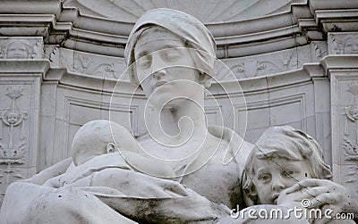 Statue of a woman in London Stock Photo