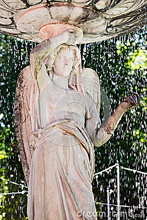 Statue woman waterfall Dublin park Stock Photo