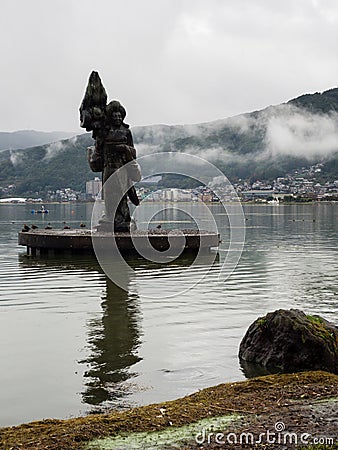 Statue of Yaegaki-hime at Lake Suwako waterfront in Kamisuwa, Nagano prefecture Editorial Stock Photo