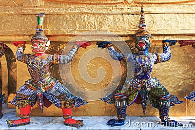 Statue of Yaksa on guard at the Temple of the Emerald Buddha Stock Photo