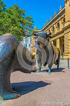 Statues of a bear and a bull in front of Stock Exchange building in Frankfurt, Germany Editorial Stock Photo