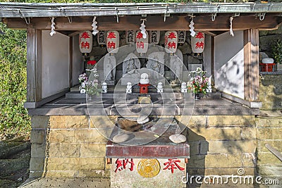 Statues of Buddhist JizÃ´, Kannon, Benzaiten in the Japanese Kazagashira-Daigongen shrine of Nagasaki. Editorial Stock Photo