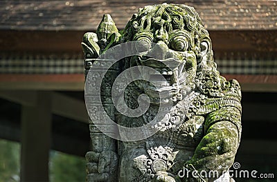Statues and carvings depicting demons, gods and Balinese mythological Stock Photo
