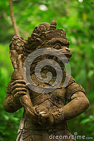 Statues and carvings depicting demons, gods and Balinese mythological deities. Stock Photo