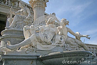 Statues of the fountain in front of the Austrian Parliament in Vienna, Austria Stock Photo