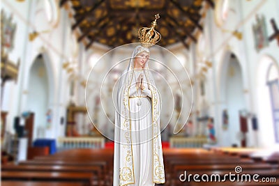 Statues of Holy Women in blur Roman Catholic Church background Stock Photo