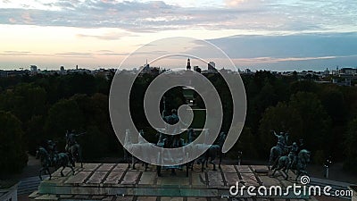 Statues of horses over the arch of peace in Milan - aerial shot at sunrise Stock Photo