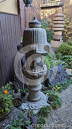 Statues in a Japanese garden in Kyoto Japan Editorial Stock Photo