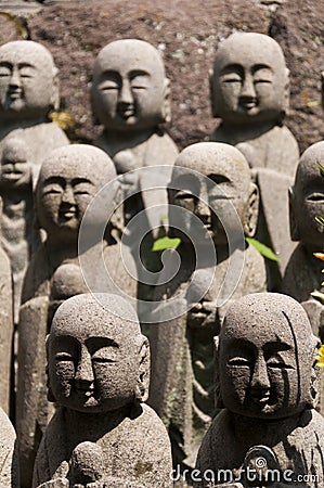 Statues of japanese monk Jizo Stock Photo