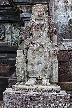 statues or reliefs in the Penataran temple complex. Editorial Stock Photo