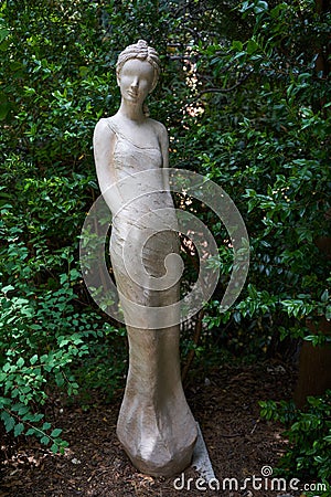 Eze, France - June 17, 2021 - the exotic garden of Eze with statues of resplendent women Editorial Stock Photo