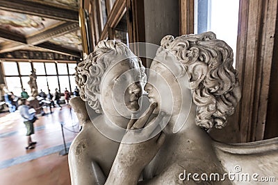 Statues and tourists in the Uffizi Gallery, Florence, Italy Editorial Stock Photo