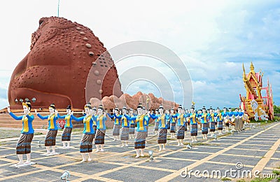 Statues of women dancers in the procession of Boon Bang Fai bamboo rocket Festival Editorial Stock Photo