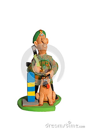 Statuette of border guard with a dog Stock Photo