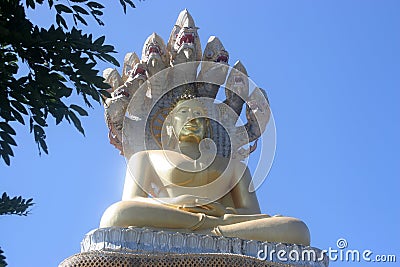 Statuette of Buddha with dragons Buddhist temple in Chiang Mai, Thailand Stock Photo