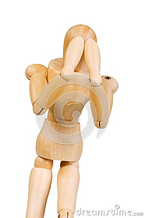 Statuette figure wooden man human makes shows experiences emotional action on a white background. Stock Photo